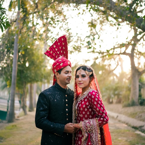 A Pakistani couple smiling together at their wedding
